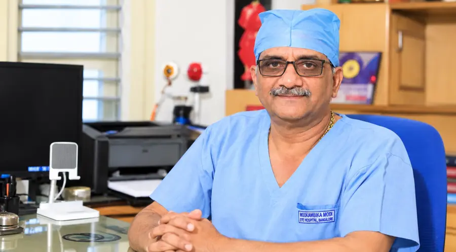 Senior eye surgeon in consultation at Mookambika Modi Eye Hospital Tumkur