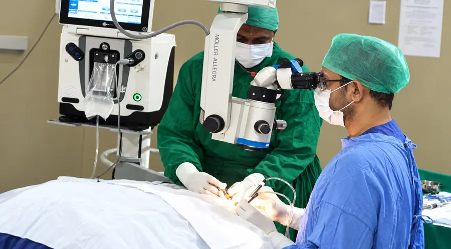 Surgical team during eye procedure at Mookambika Modi Eye Hospital
